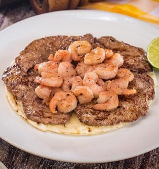 Solomo con Camarones al Ajillo